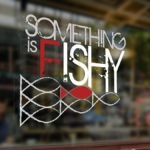 Something is Fishy window signage
